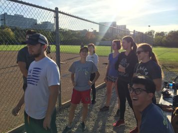 Applied Master's students and PhD students play baseball 
